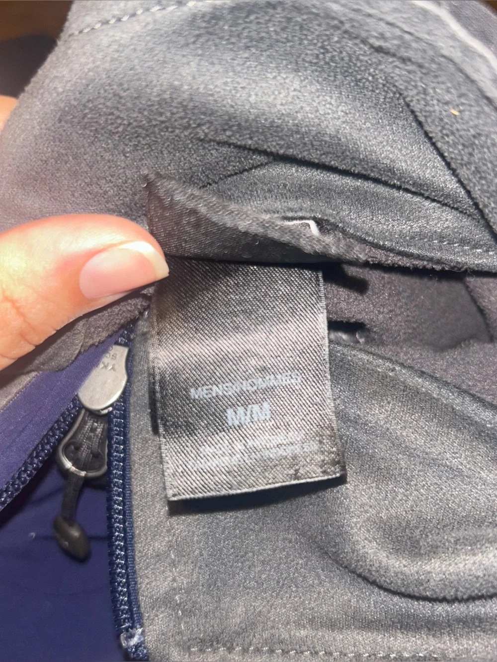 The North Face Men’s Blue and Black Softshell Jacket